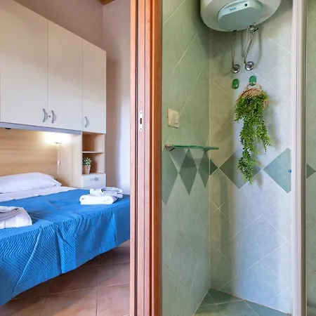 Сasa de vacaciones A Schiera Baia Mimose
